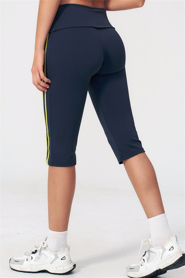 The Evoke Crop Top Capri Leggings 2-Piece Set