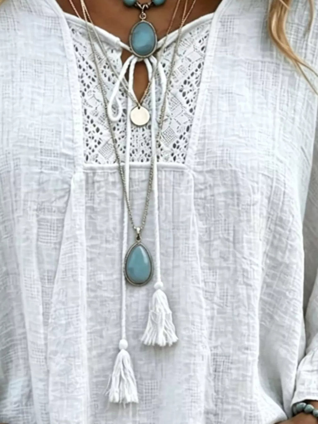 Full Size Tassel Tie Neck Ruffled Hem Blouse Plus Size