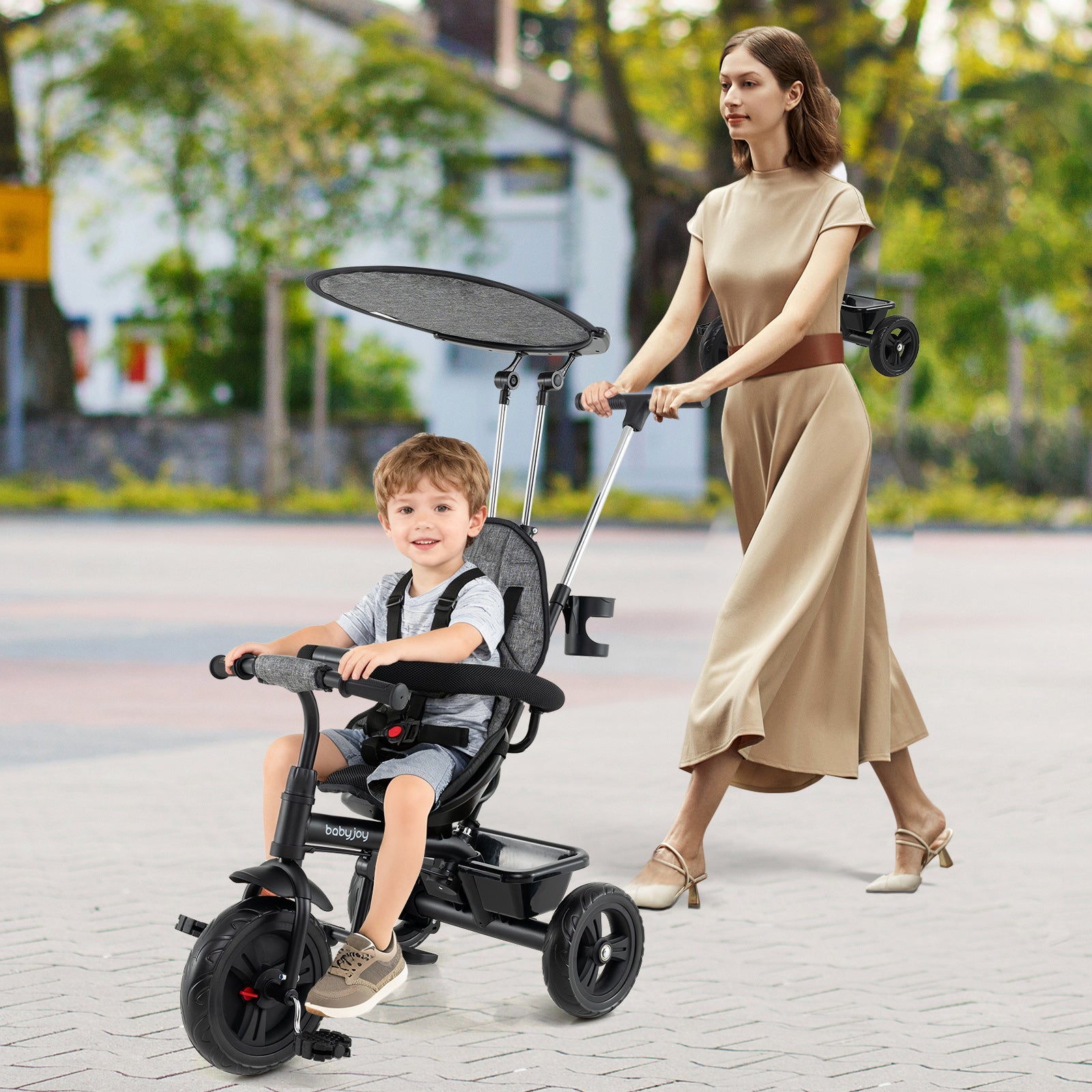 7-in-1 Baby Stroller Tricycle with Adjustable Canopy and Foldable Footrests for Ages 9-60 Months Old