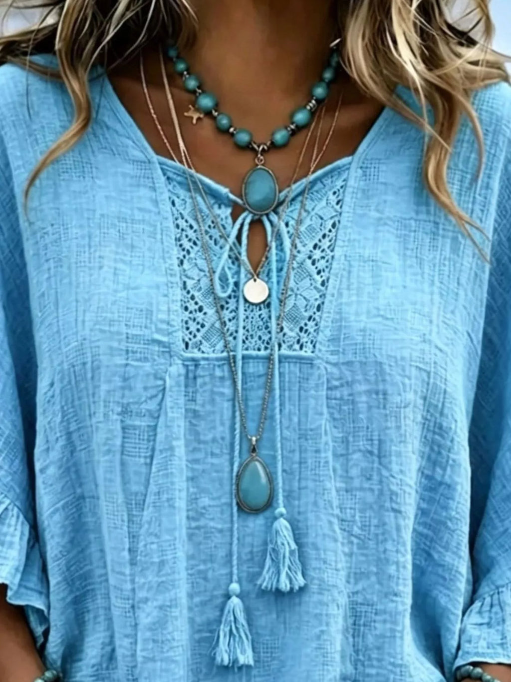 Full Size Tassel Tie Neck Ruffled Hem Blouse Plus Size