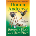 Between a Flock and a Hard Place: A Meg Langslow Mystery - Hardcover