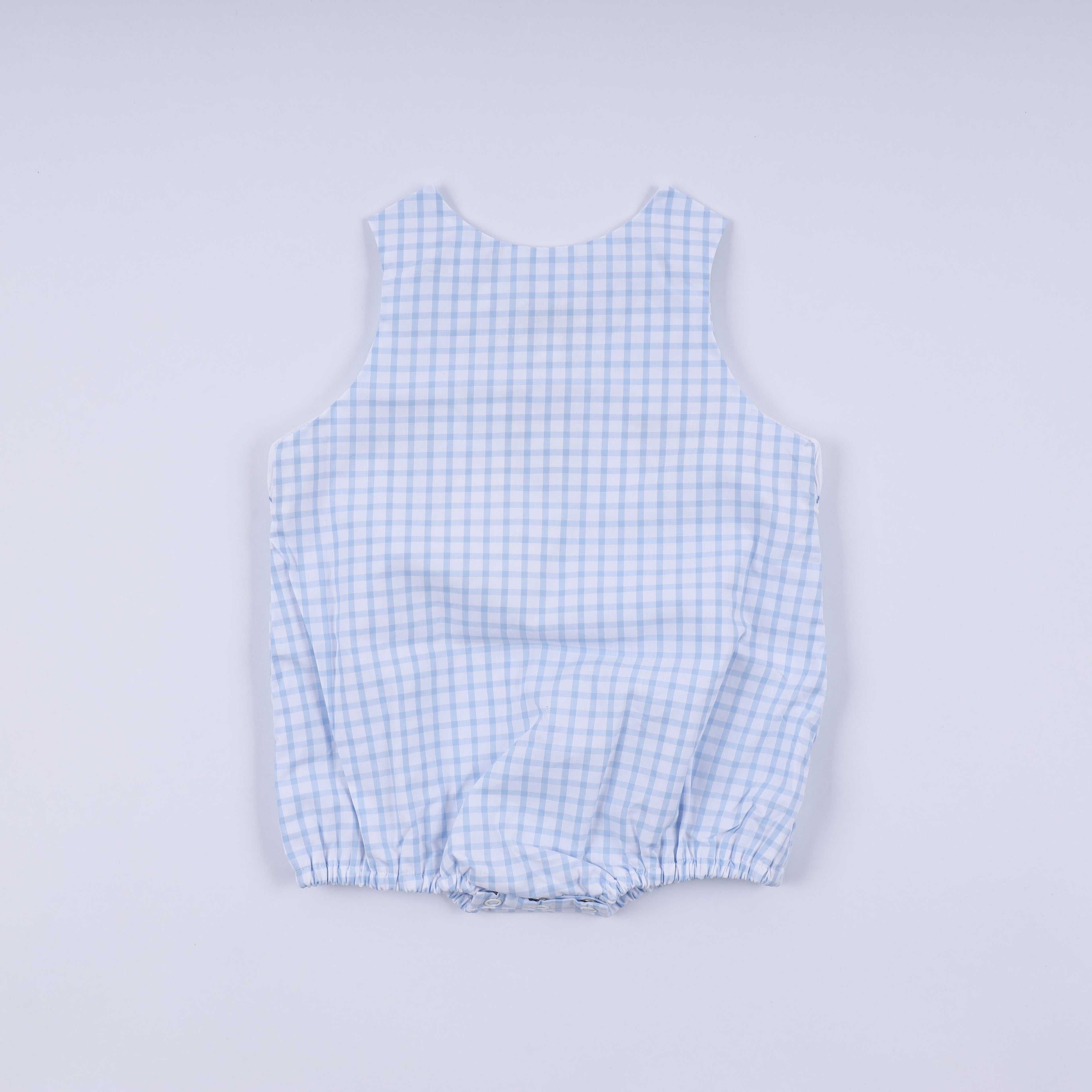 Blue character hand smocked gingham bubble