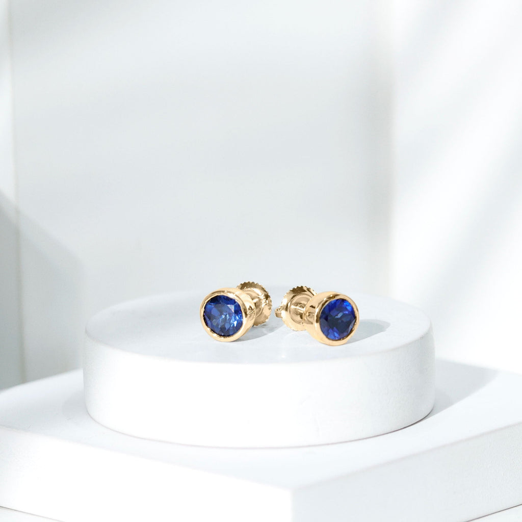 2 Carat Round Lab Created Blue Sapphire Stud Earrings in Bezel Setting