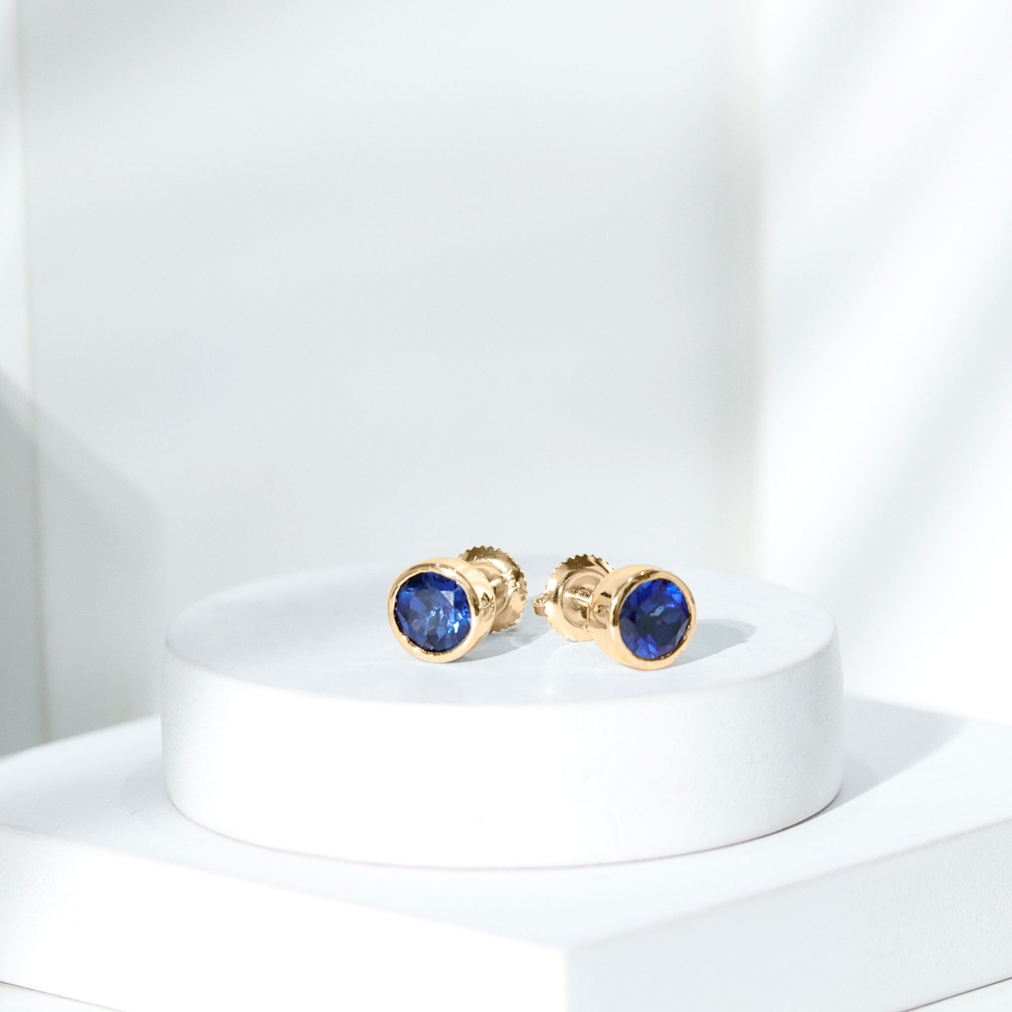2 Carat Round Lab Created Blue Sapphire Stud Earrings in Bezel Setting