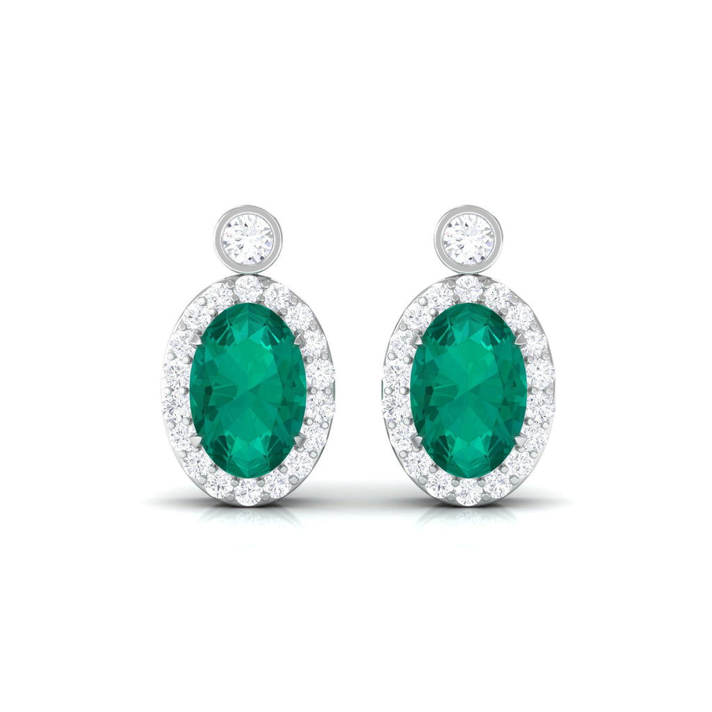 0.8 Carat Oval Emerald and Diamond Halo Stud Earrings