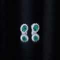 Lab Created Emerald Oval Stud Earrings with Moissanite Halo