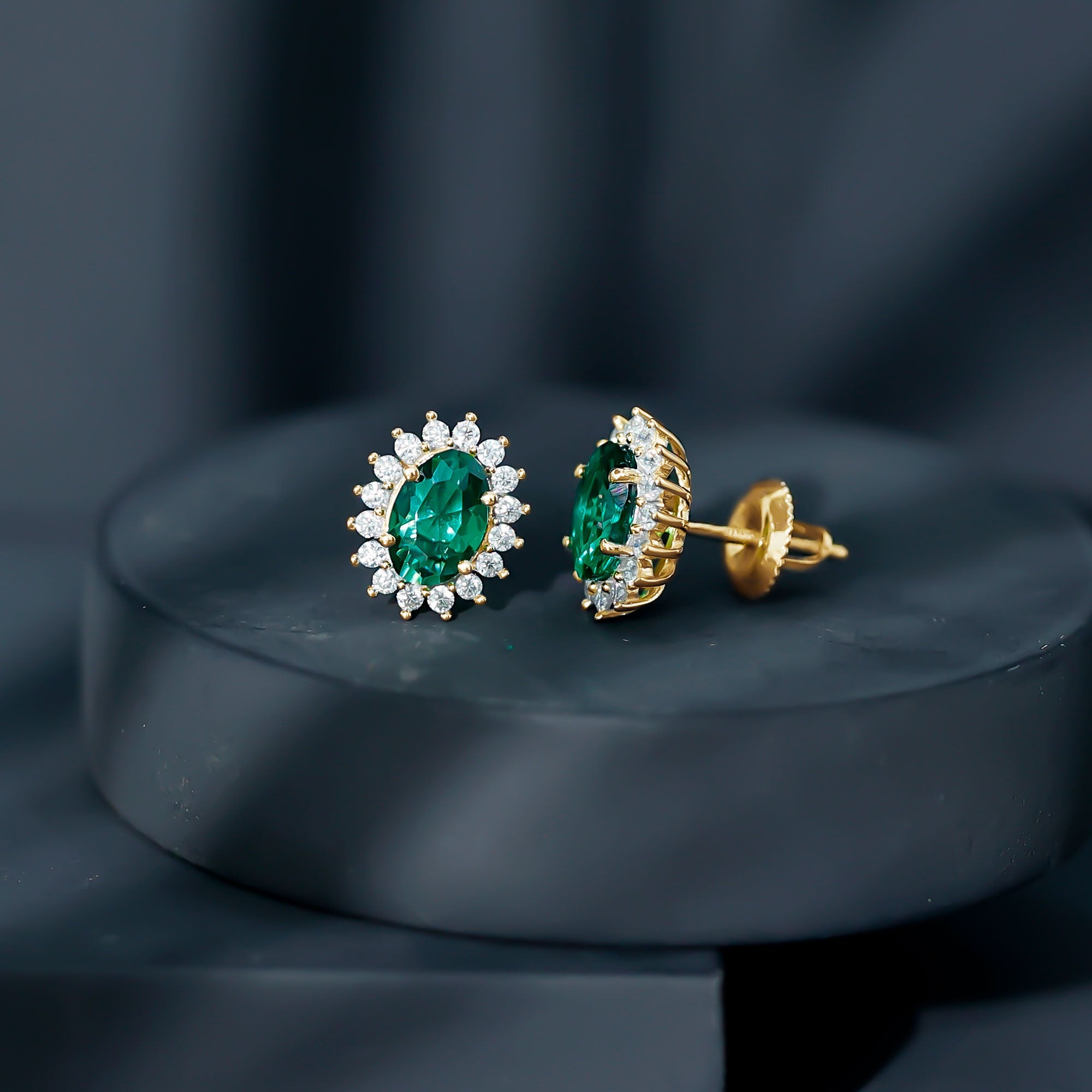 Lab Created Emerald Oval Stud Earrings with Moissanite Halo