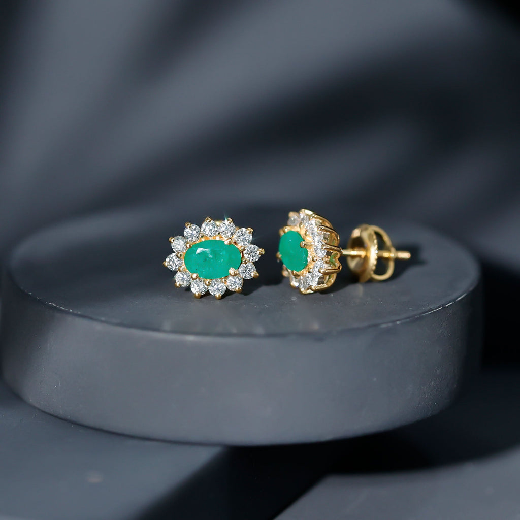 Natural 0.8 Carat Oval Cut Emerald and Diamond Earrings