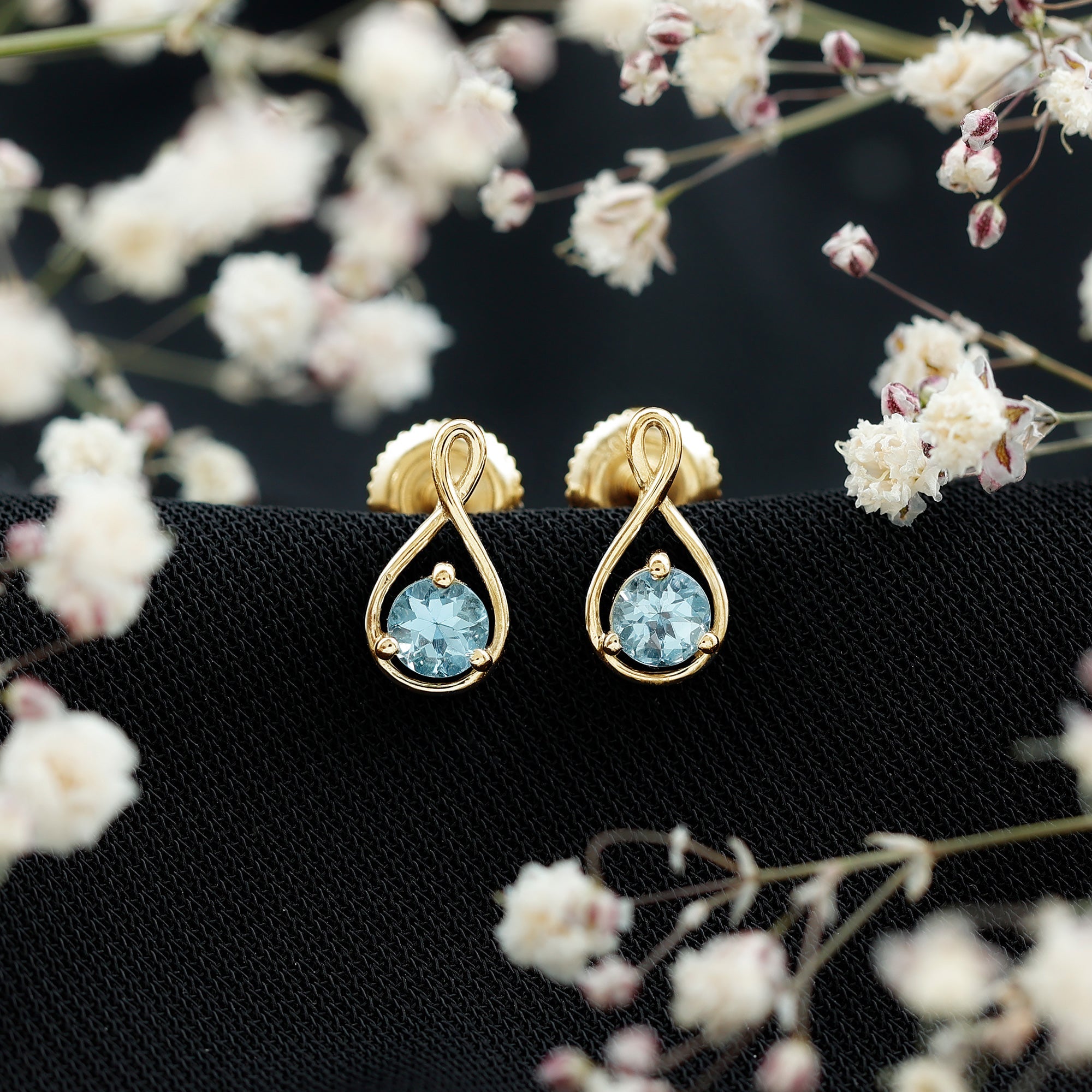 Genuine 0.5 Carat Aquamarine Infinity Stud Earrings