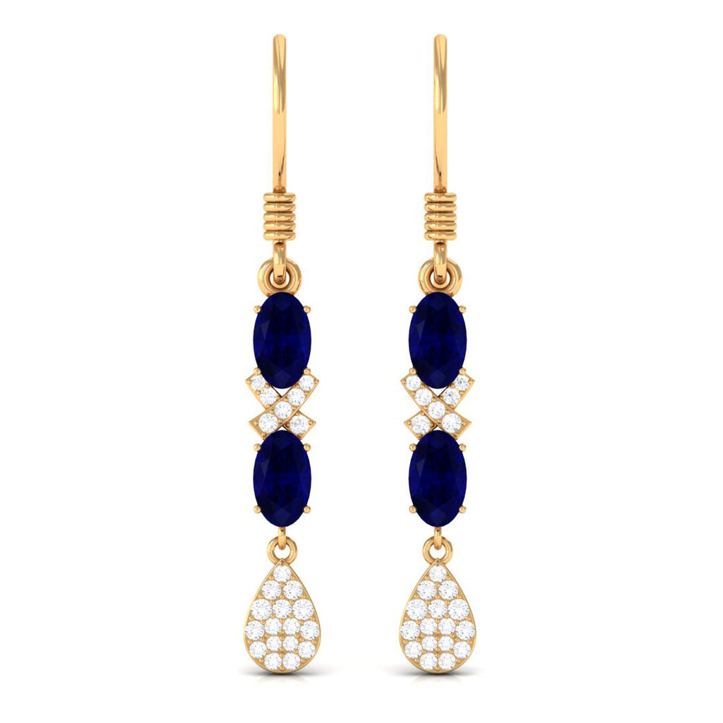 Oval Cut Blue Sapphire and Diamond Dangle Earrings