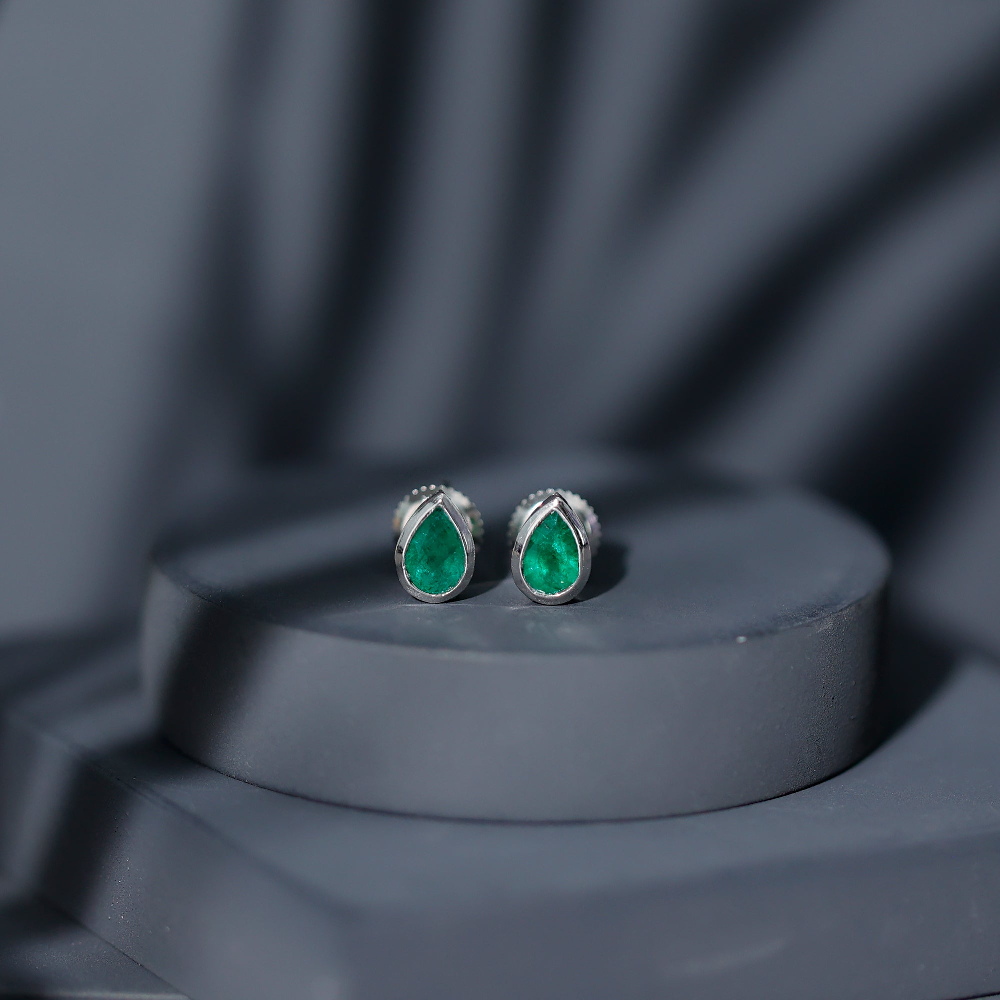 Genuine Emerald Teardrop Stud Earrings in Bezel Setting