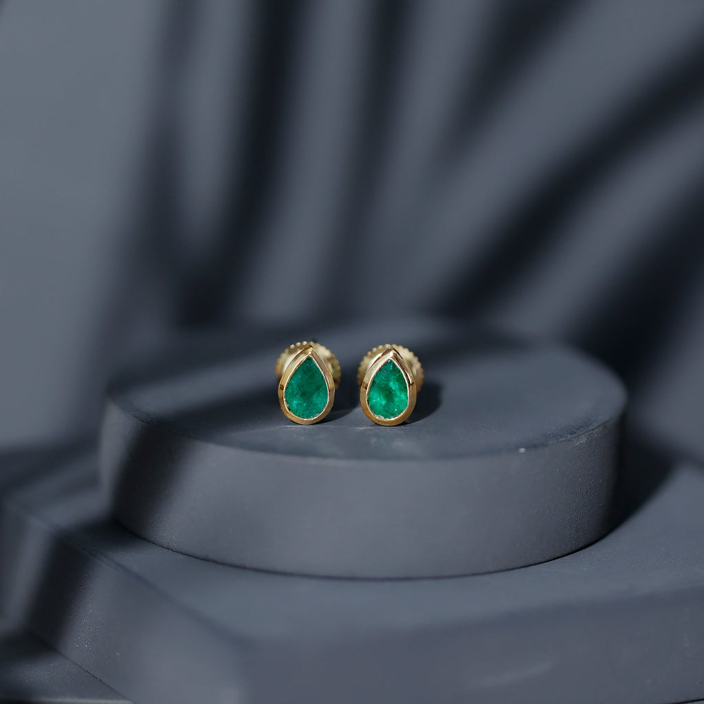 Genuine Emerald Teardrop Stud Earrings in Bezel Setting