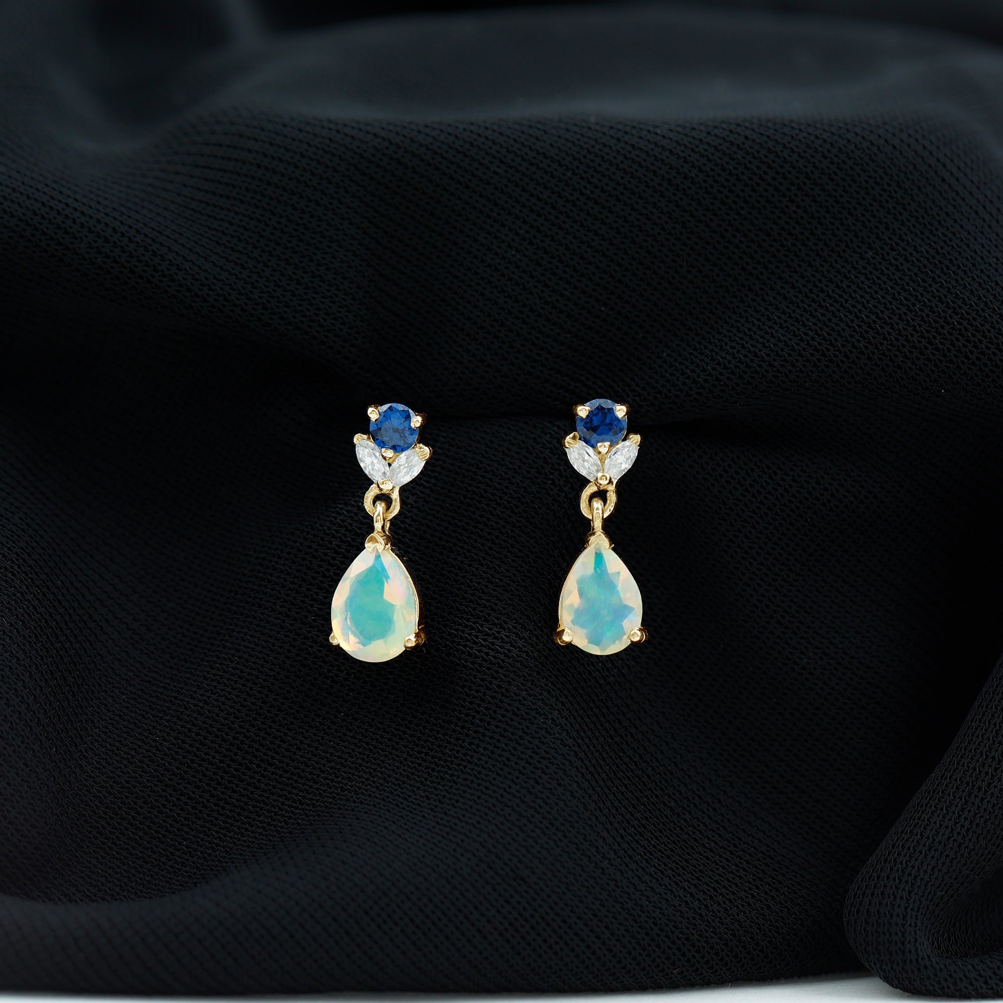 1.4 Carat Ethiopian Opal Teardrop Earrings with Lab Blue Sapphire