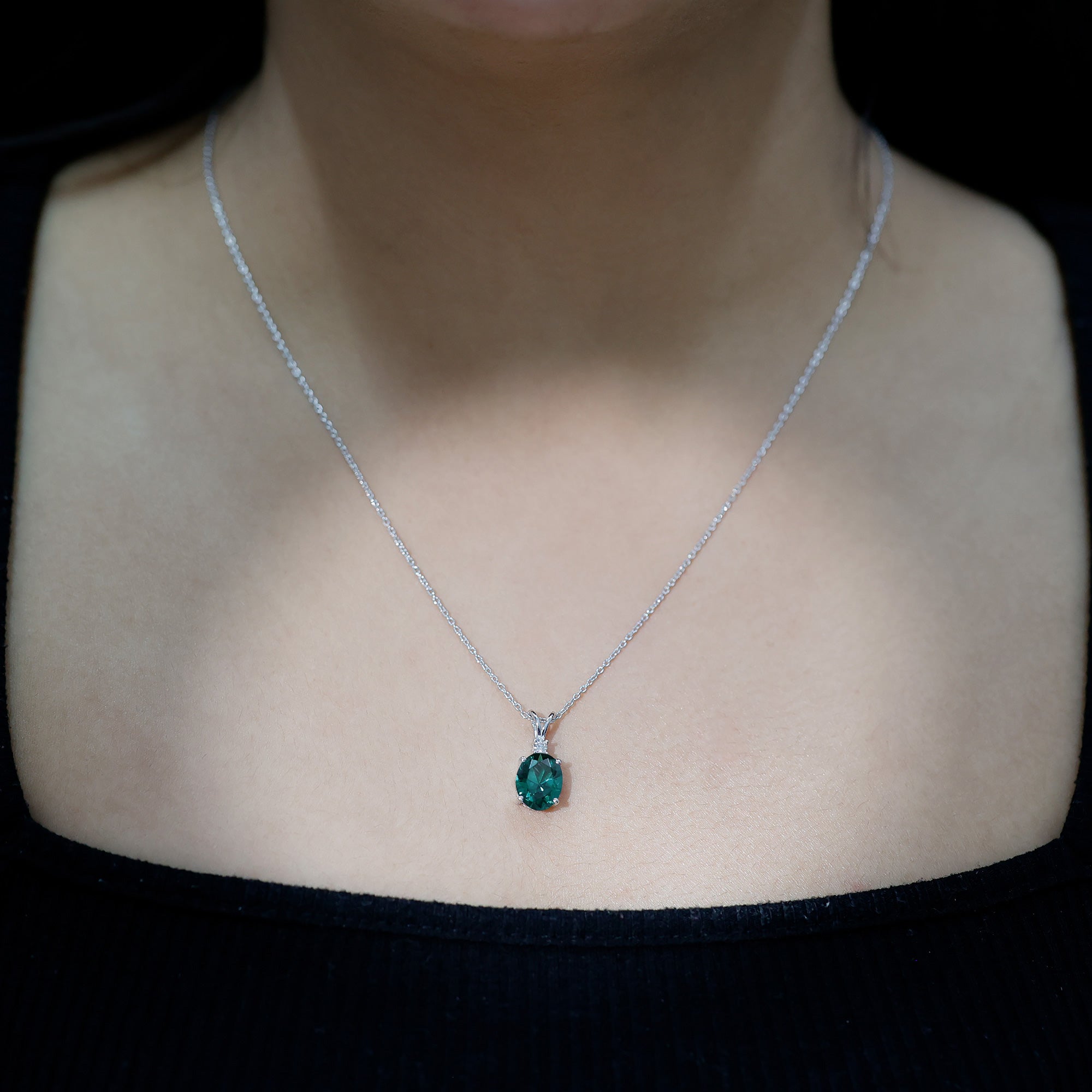 Oval Created Emerald and Moissanite Solitaire Pendant