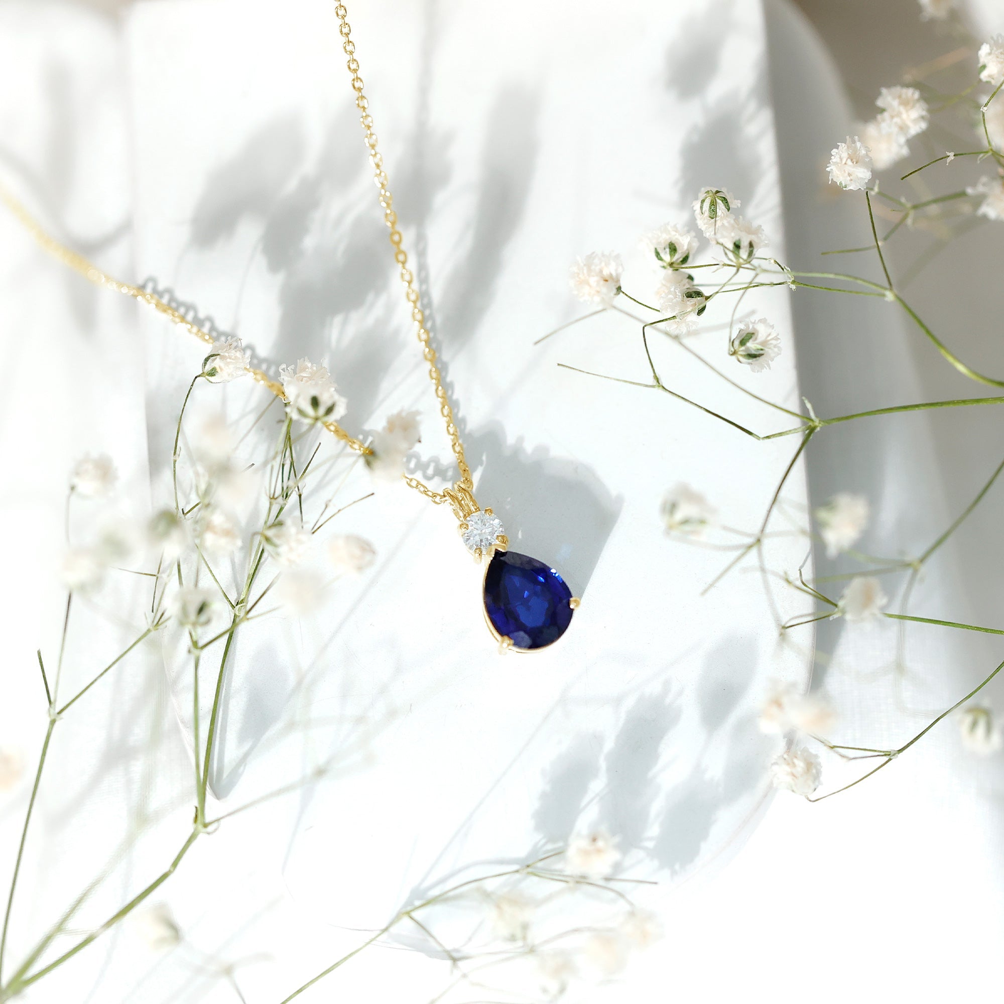 Lab Created Blue Sapphire Teardrop Pendant Necklace with Diamond