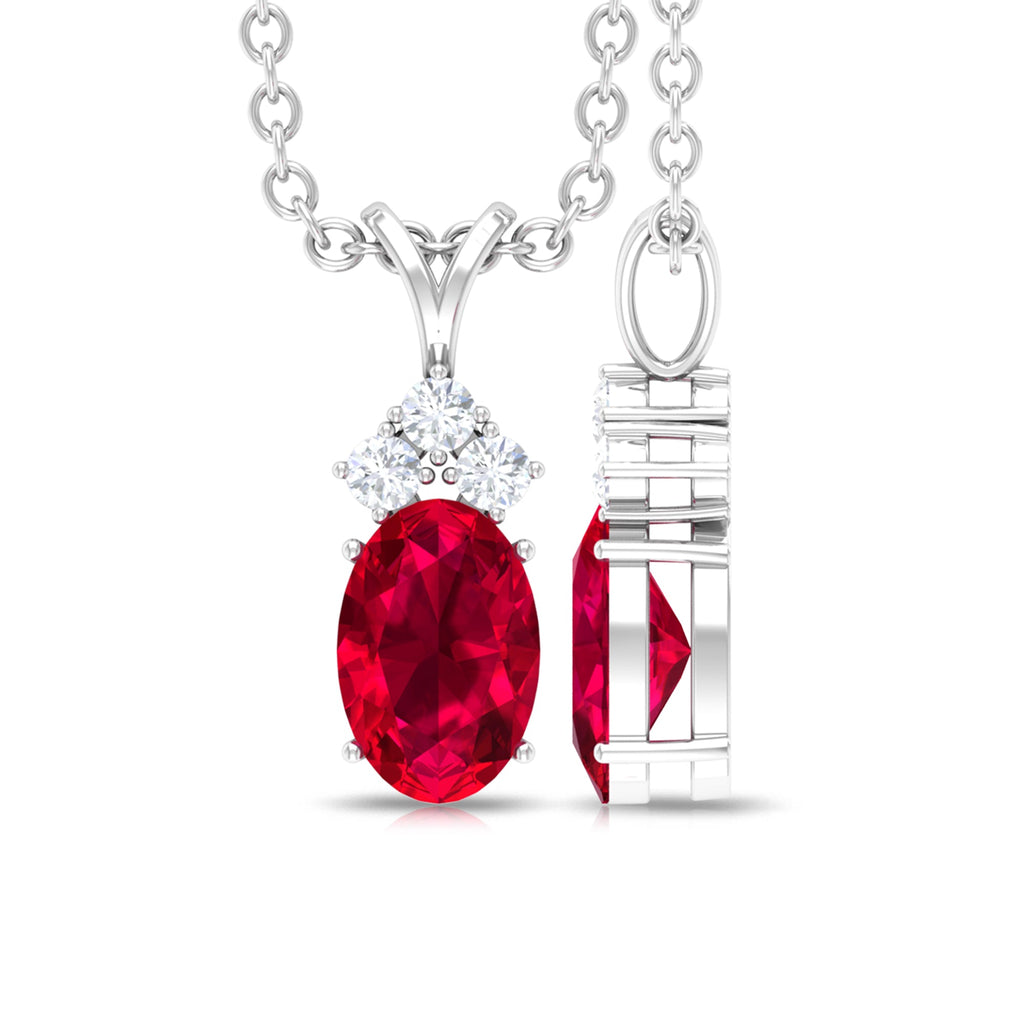 Natural 0.6 Carat Oval Ruby Pendant with Diamond Trio
