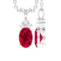 Oval Lab Created Ruby Pendant with Diamond trio