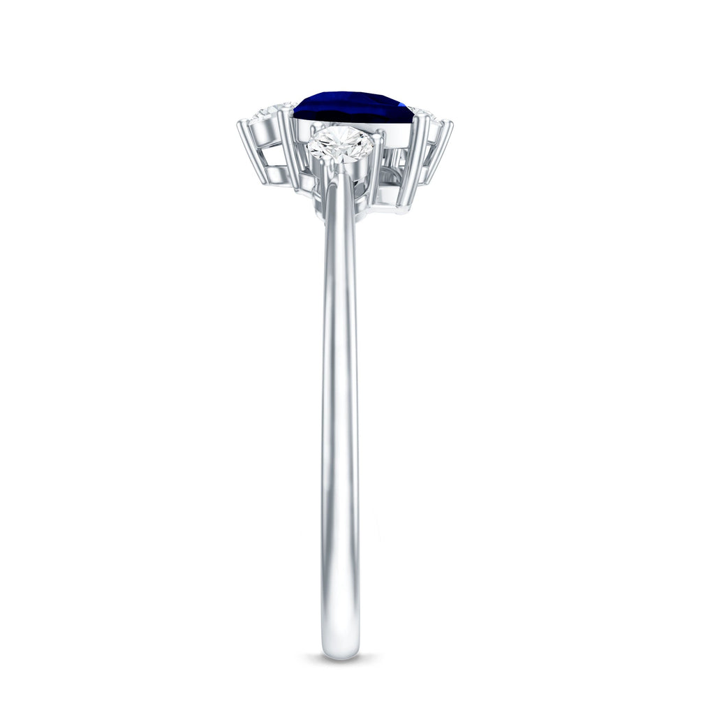 Lab Created Blue Sapphire and Diamond Cluster Ring