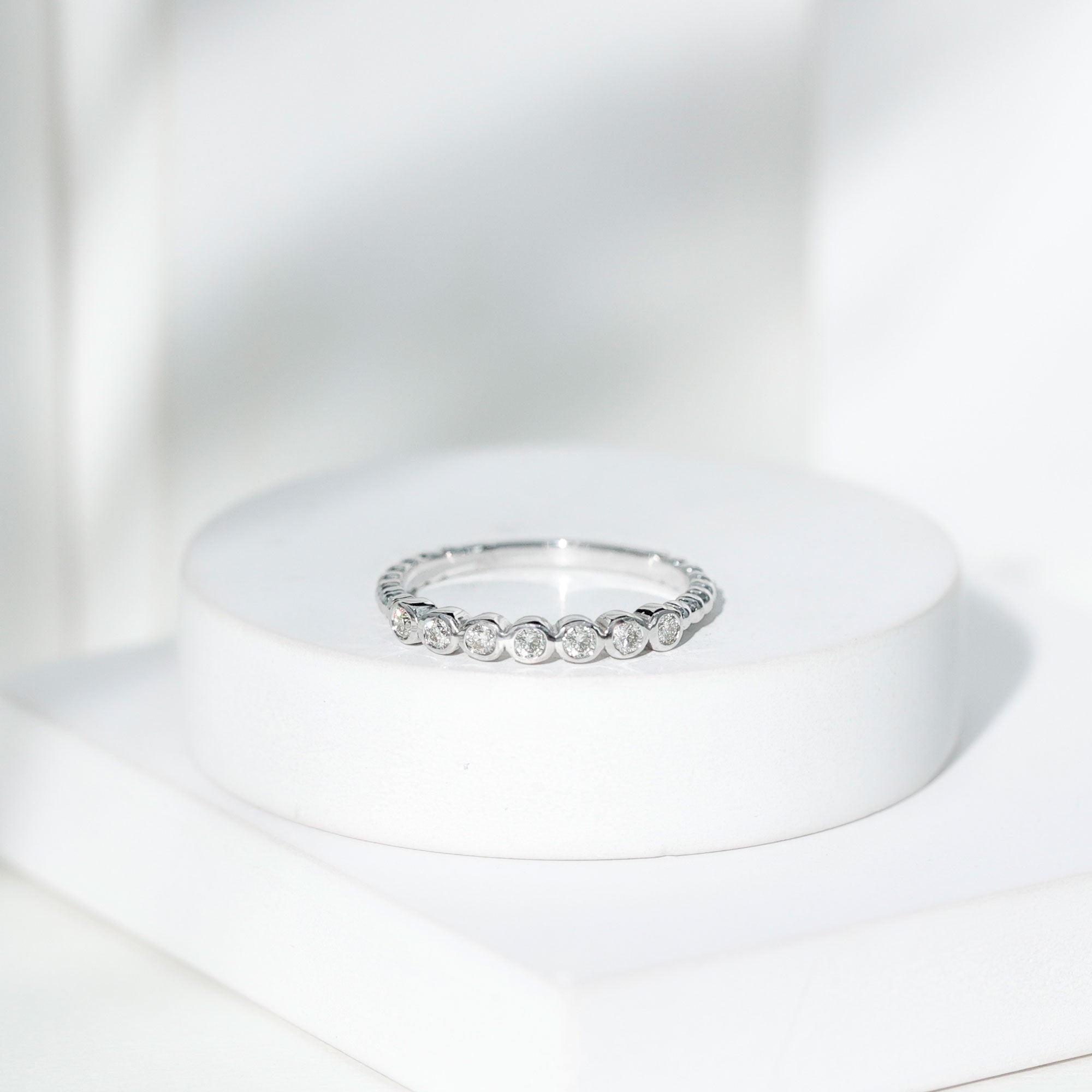 Bezel Set Round Diamond Half Eternity Ring