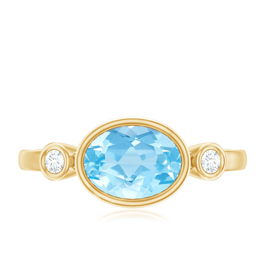 Bezel Set Aquamarine and Diamond East West Engagement Ring