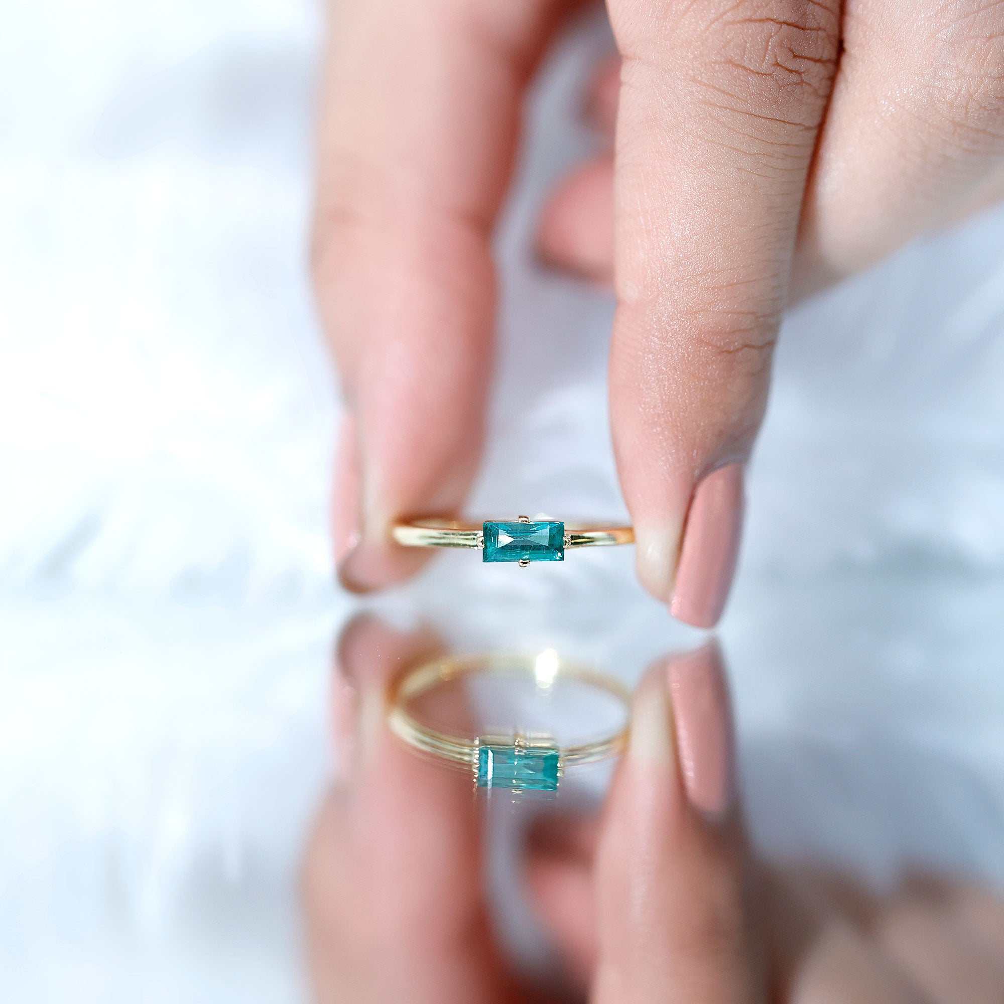 East West Set Baguette Cut Emerald May Birthstone Ring