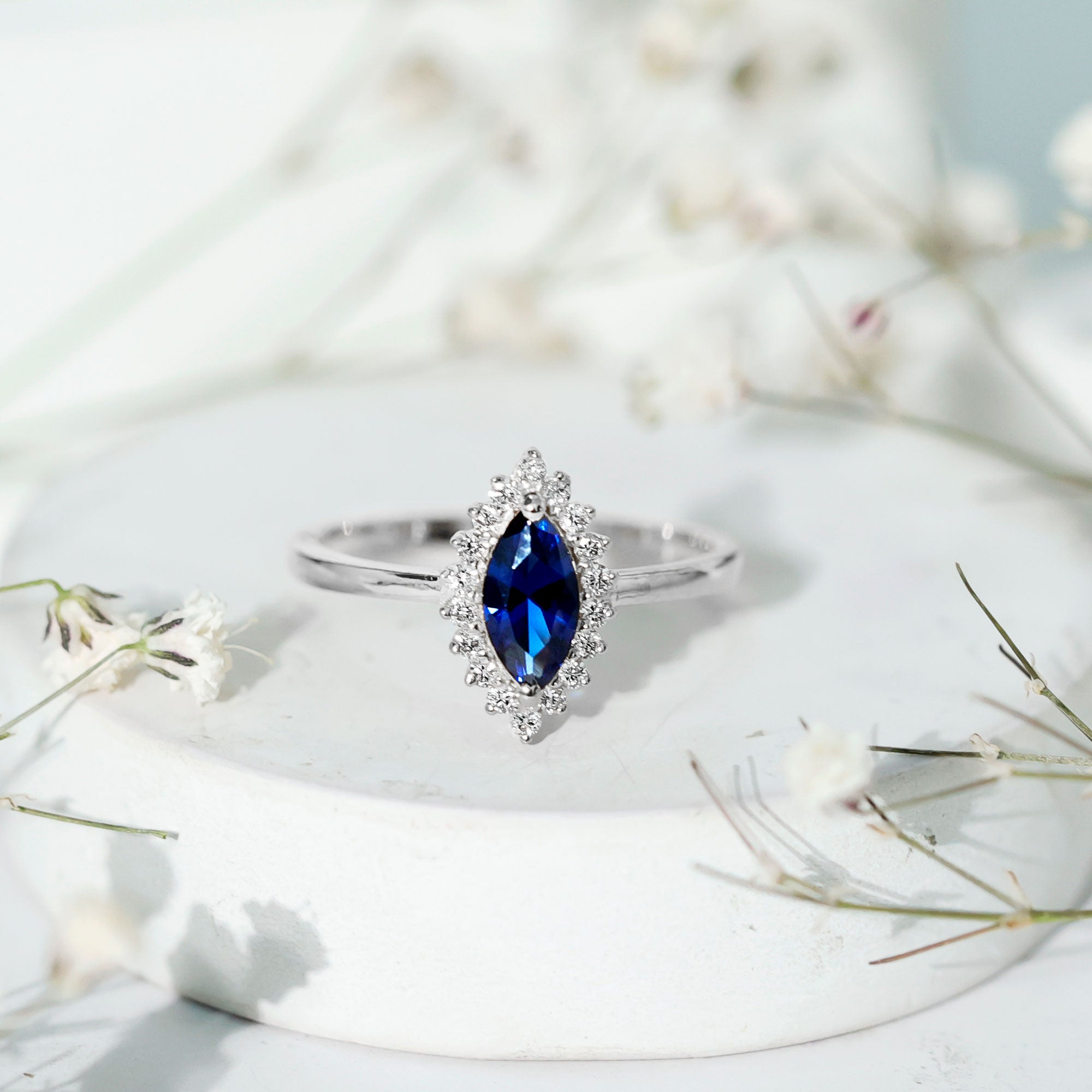 Marquise Cut Lab Grown Blue Sapphire and Diamond Halo Engagement Ring