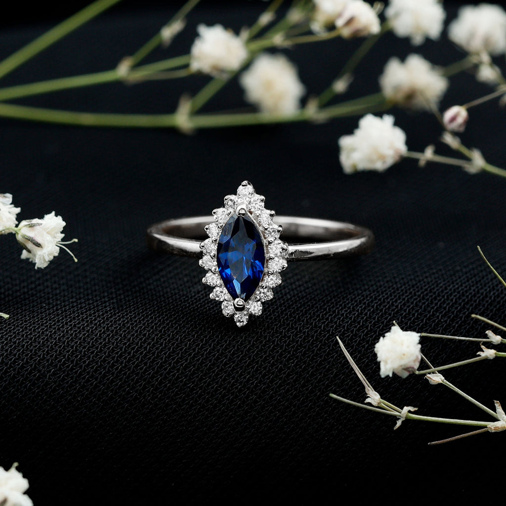 Marquise Cut Lab Grown Blue Sapphire and Diamond Halo Engagement Ring