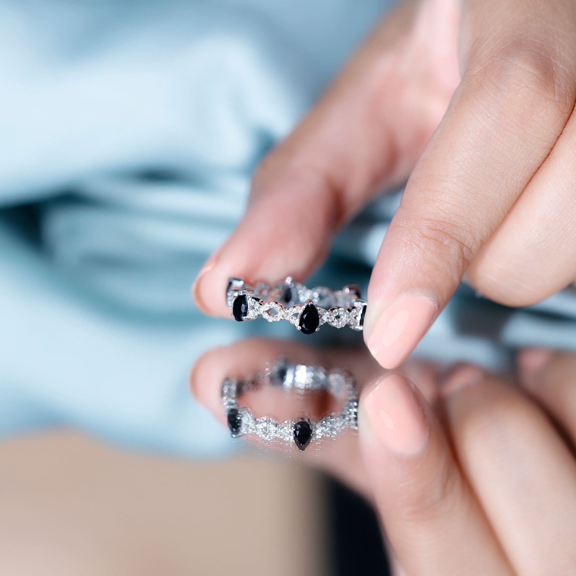 Pear Shaped Black Onyx and Diamond Crossover Wedding Band