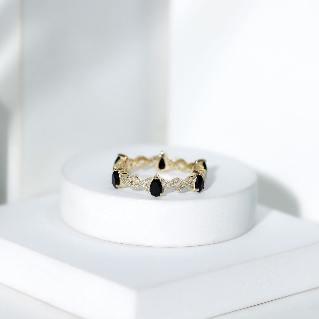 Pear Shaped Black Onyx and Diamond Crossover Wedding Band