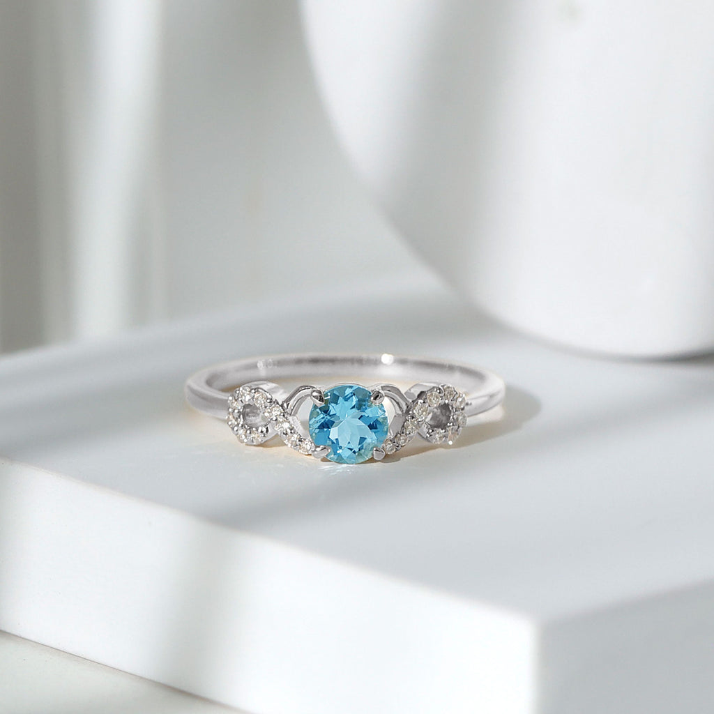 Round Shape Aquamarine and Diamond Infinity Engagement Ring