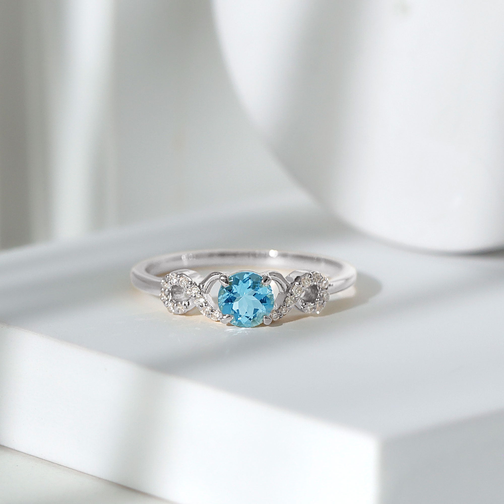 Round Shape Aquamarine and Diamond Infinity Engagement Ring