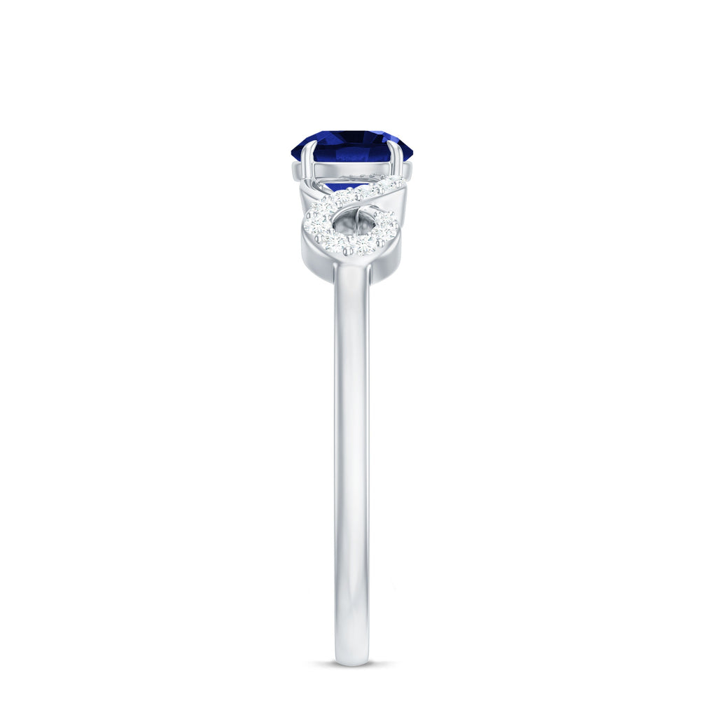 Certified 0.6 Carat Lab Grown Blue Sapphire Engagement Ring with Diamond Infinity Knot