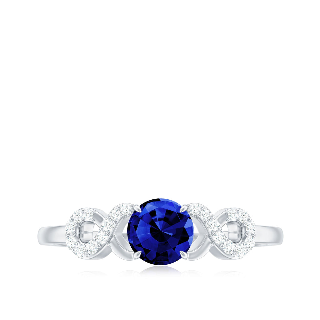 Certified 0.6 Carat Lab Grown Blue Sapphire Engagement Ring with Diamond Infinity Knot