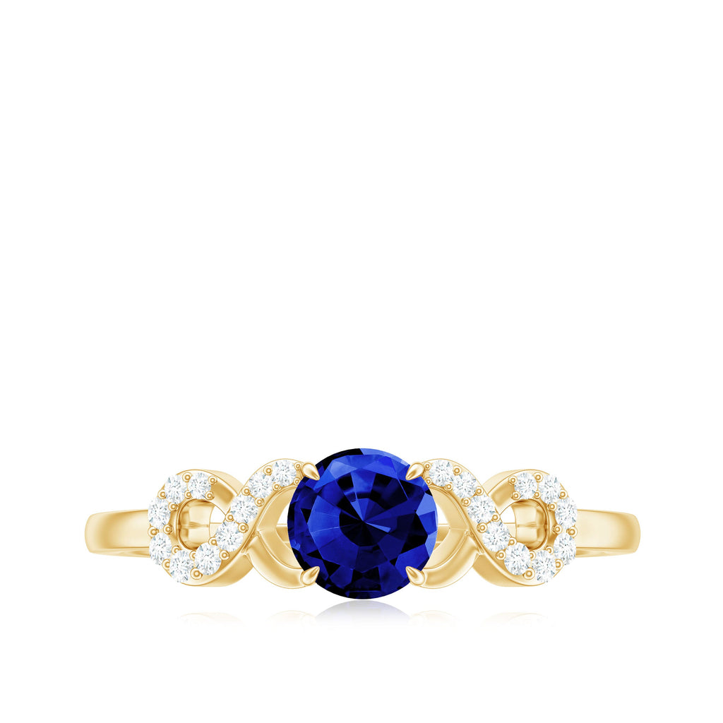 Certified 0.6 Carat Lab Grown Blue Sapphire Engagement Ring with Diamond Infinity Knot