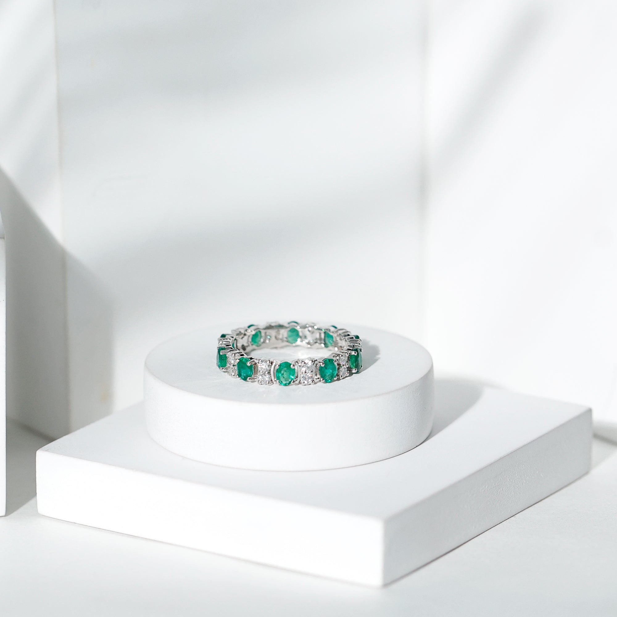 Oval Emerald and Moissanite Eternity Wedding Band