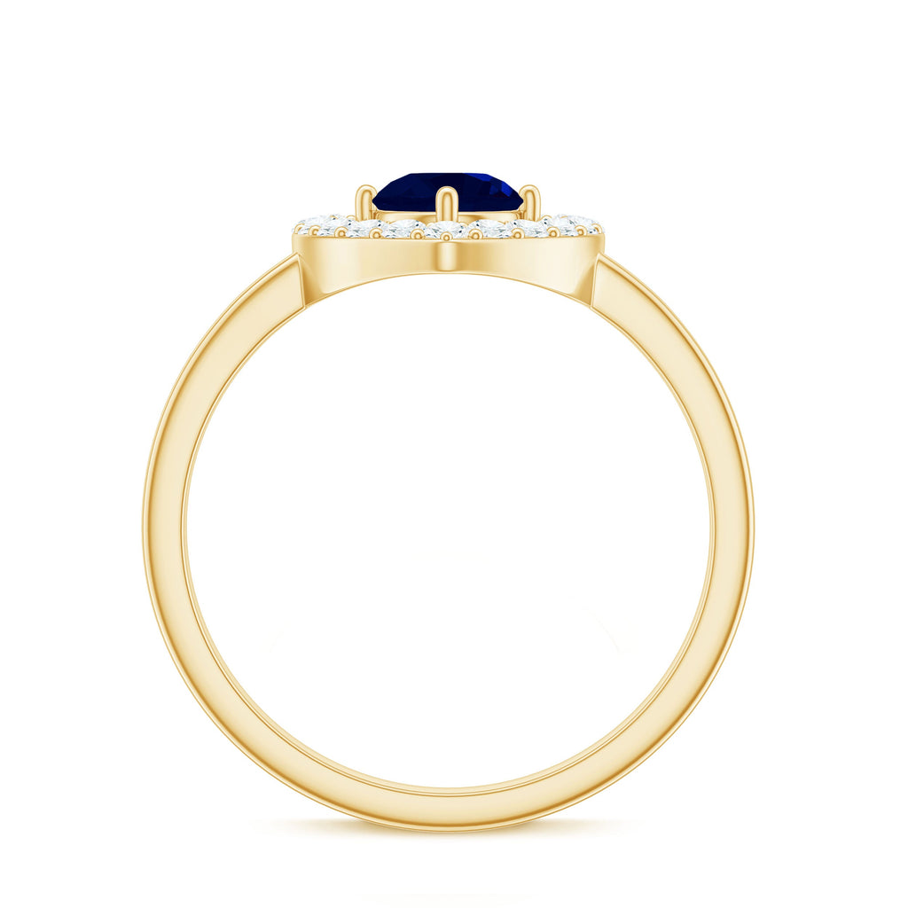 Natural 0.9 Carat Blue Sapphire Heart Engagement Ring with Diamond