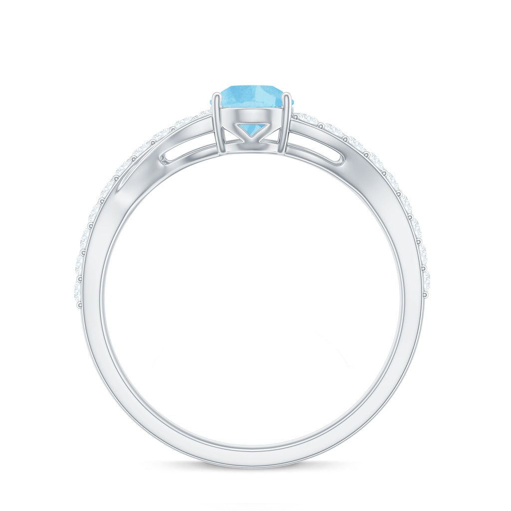 Split Shank Pear Cut Aquamarine Solitaire Ring with Diamond