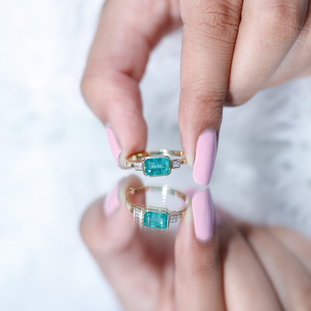 Octagon shape Emerald and Diamond East-West Promise Ring in Bezel Setting