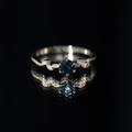 0.6 Carat Round London Blue Topaz Commitment Ring with Diamond