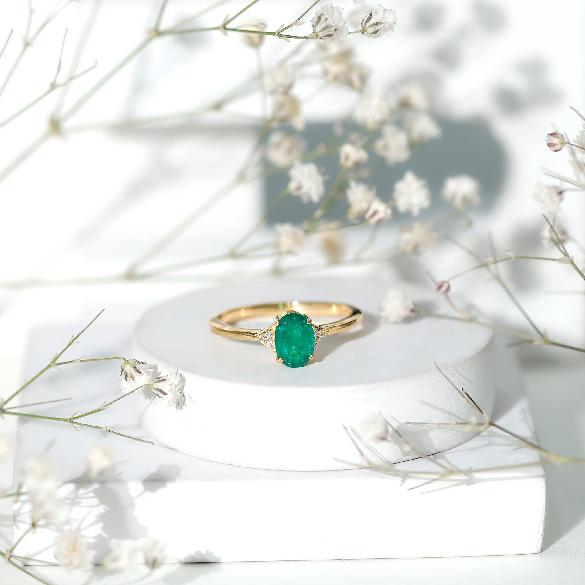 Solitaire Oval Emerald Engagement Ring with Diamonds