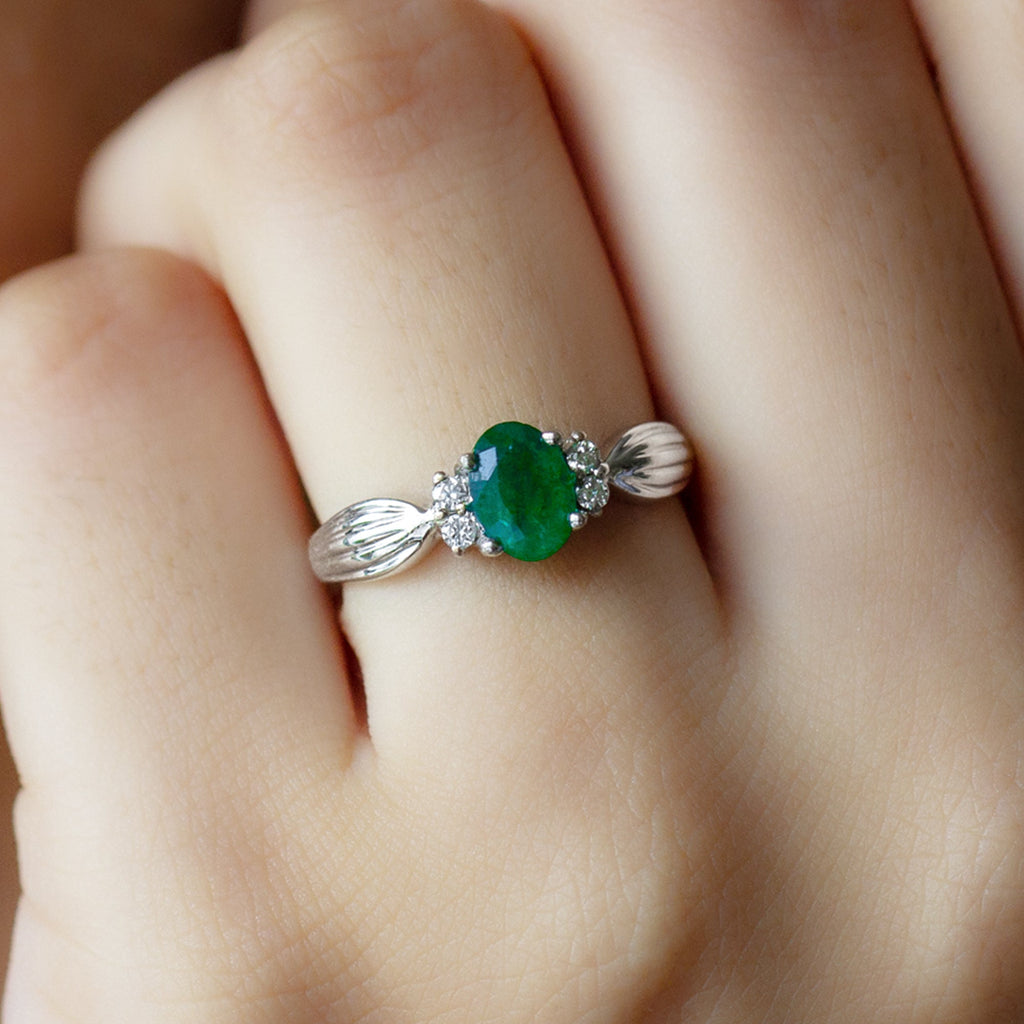 Natural 0.7 Carat Emerald Oval Engagement Ring with Diamond