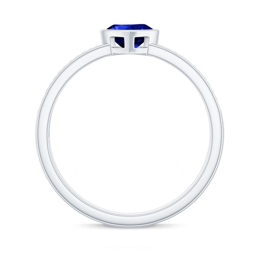 Heart Shape Created Blue Sapphire Solitaire Ring with Diamond Side Stone