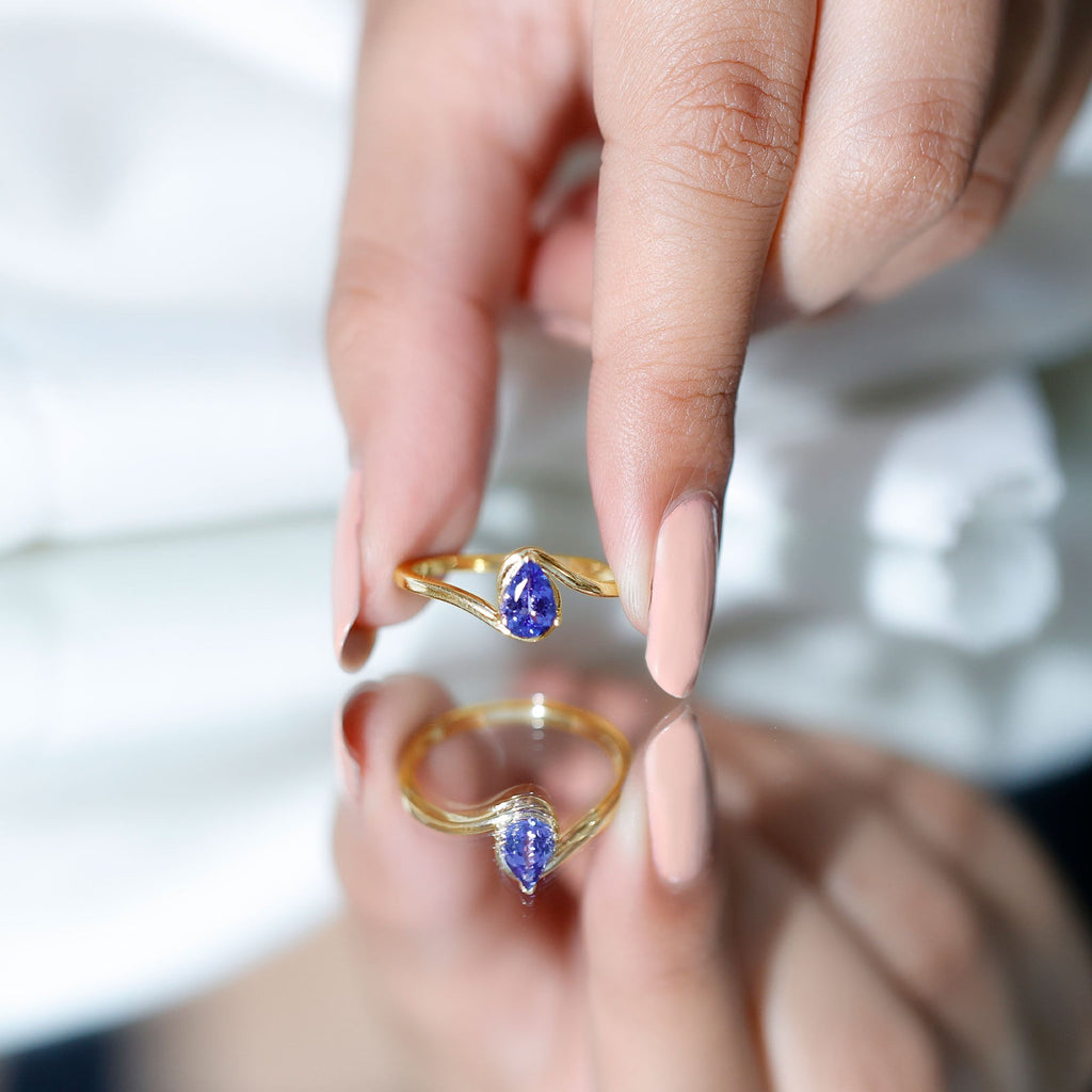 Natural Tanzanite Solitaire Engagement Ring with Bypass Shank