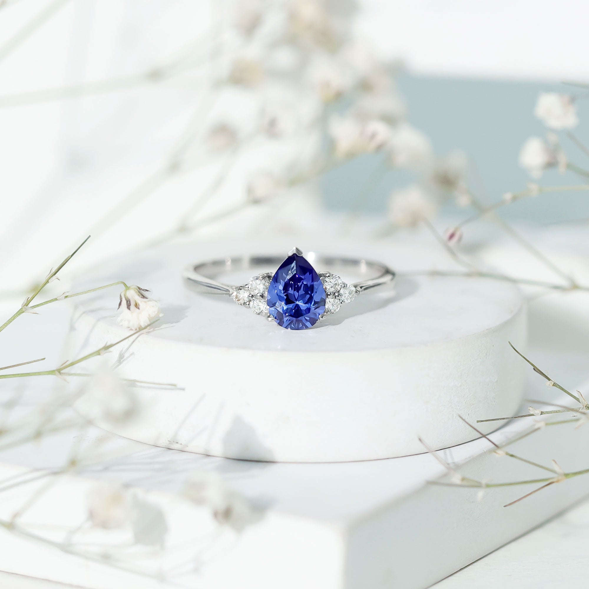 1.6 Carat Lab Blue Sapphire Teardrop Engagement Ring with Diamond Trio