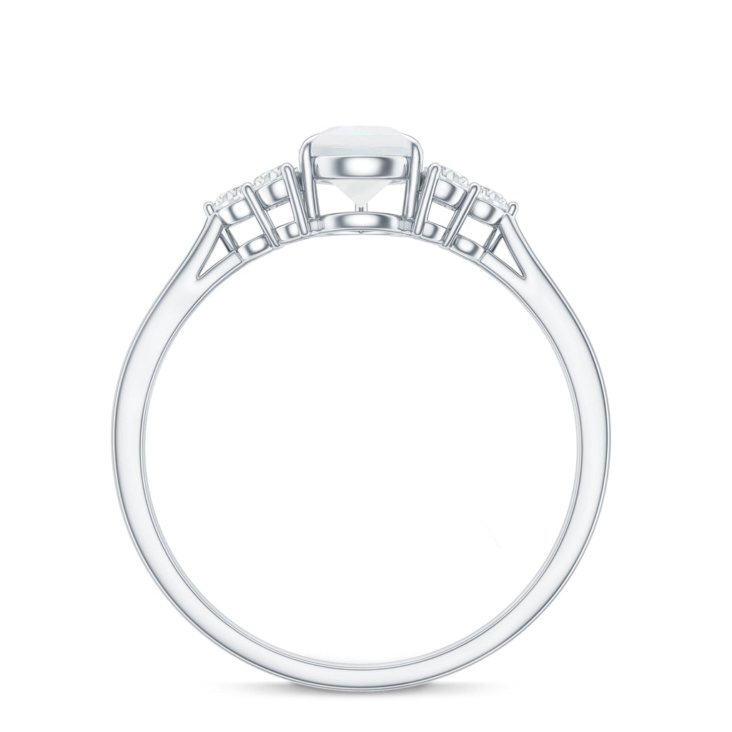 Pear Shape Moonstone Solitaire Ring with Diamond Trio