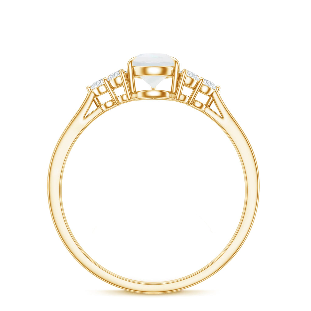 Pear Shape Moonstone Solitaire Ring with Diamond Trio