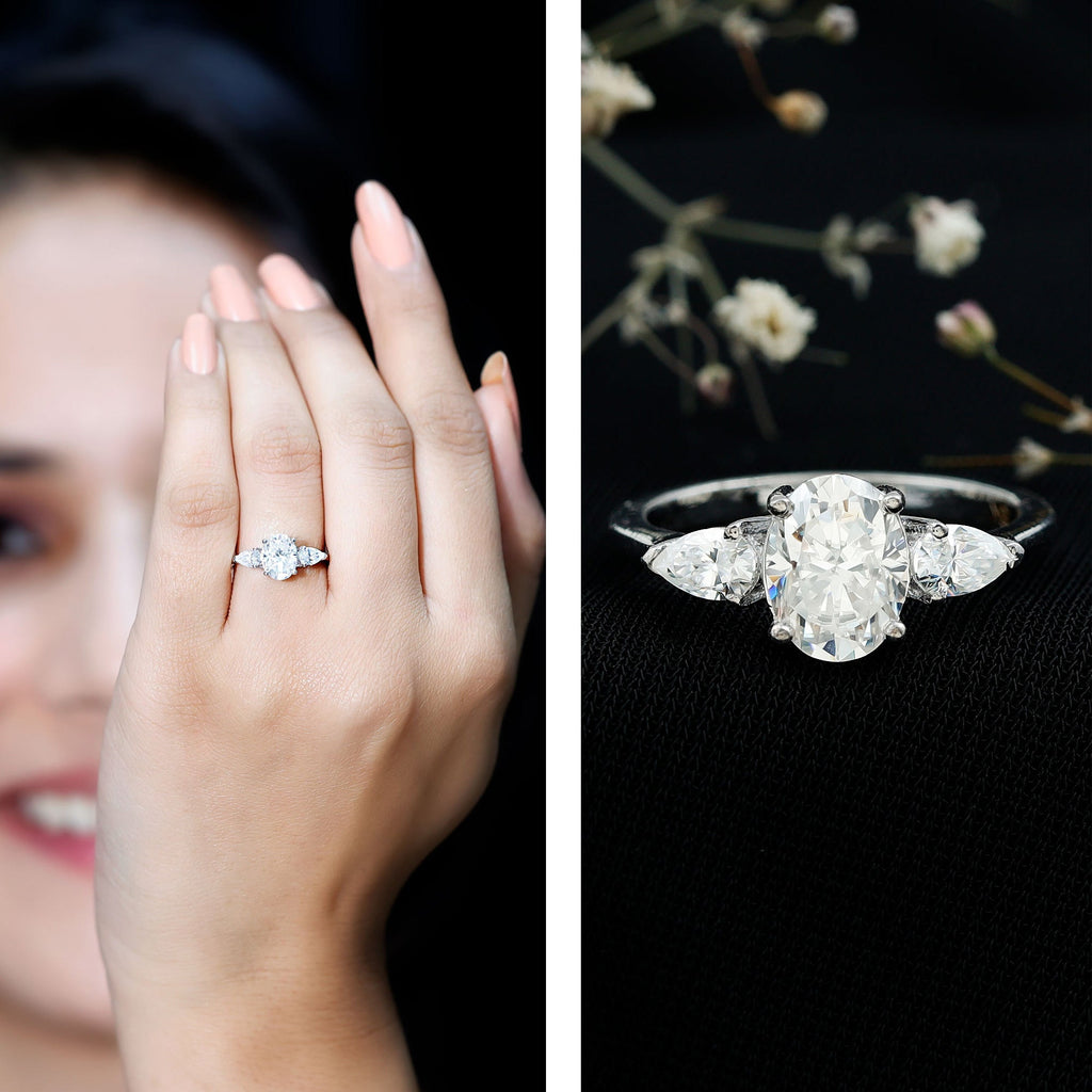 Oval and Pear Cut Moissanite Three Stone Engagement Ring