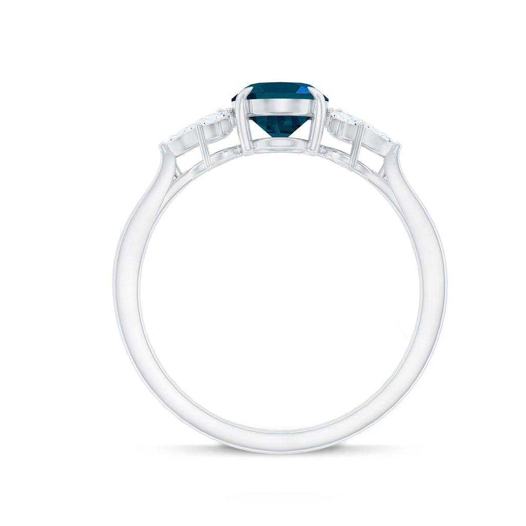 Oval Cut London Blue Topaz Engagement Ring with Diamond Trio