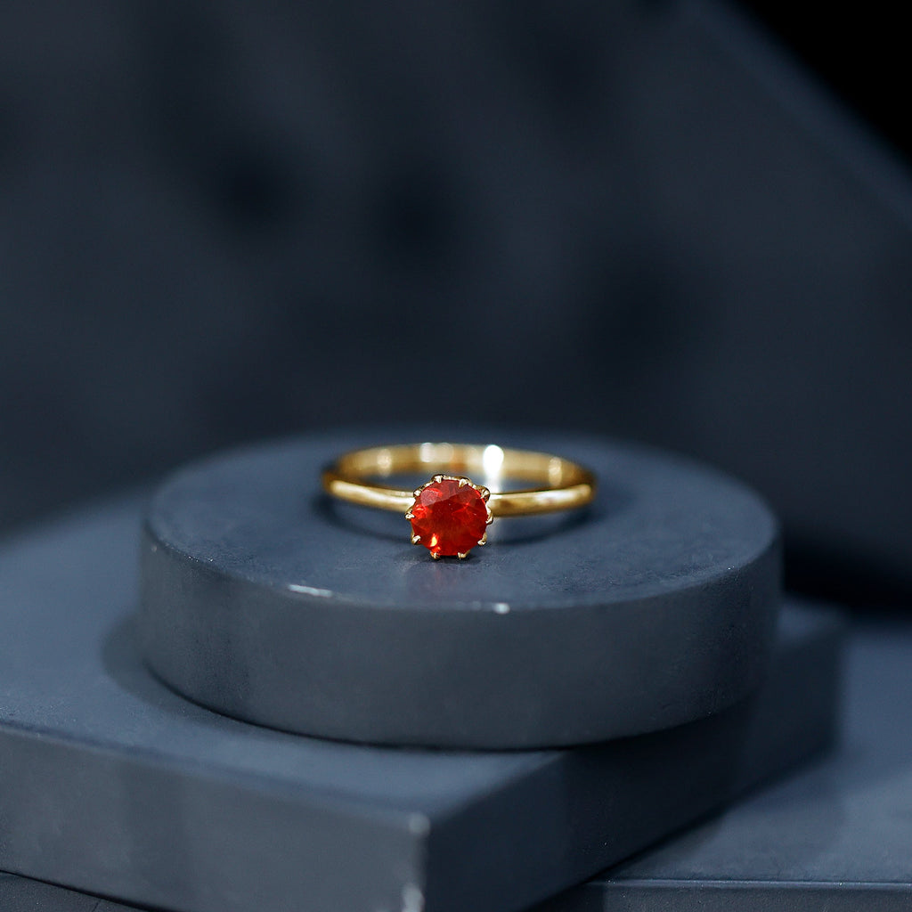 0.75 Carat Round Fire Opal Solitaire Ring in Lotus Basket Setting