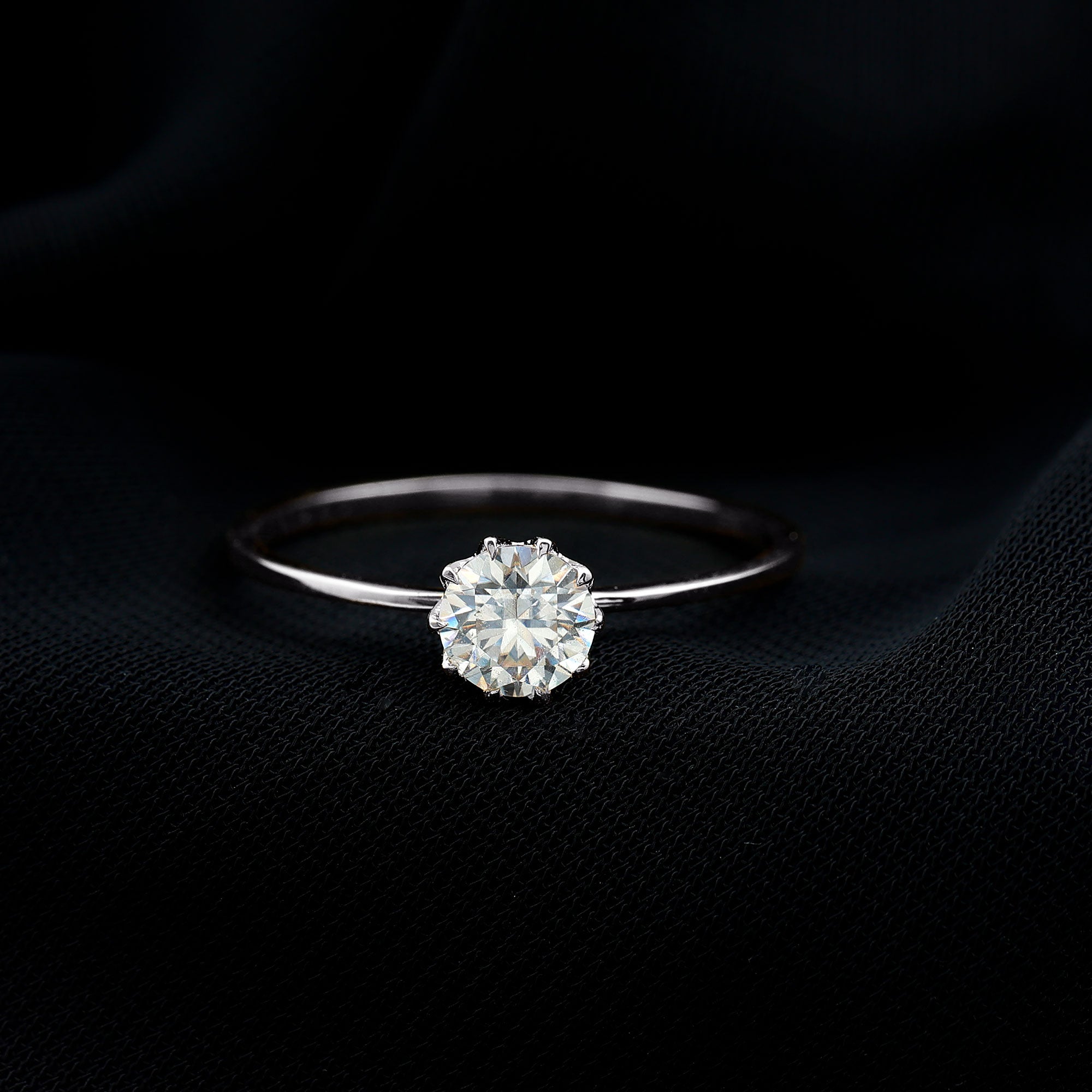 0.9 Carat Moissanite Solitaire Ring in Lotus Basket Setting